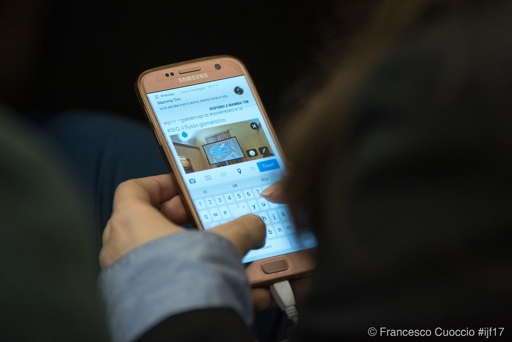 A professional working on a laptop with an AI interface, symbolizing digital innovation