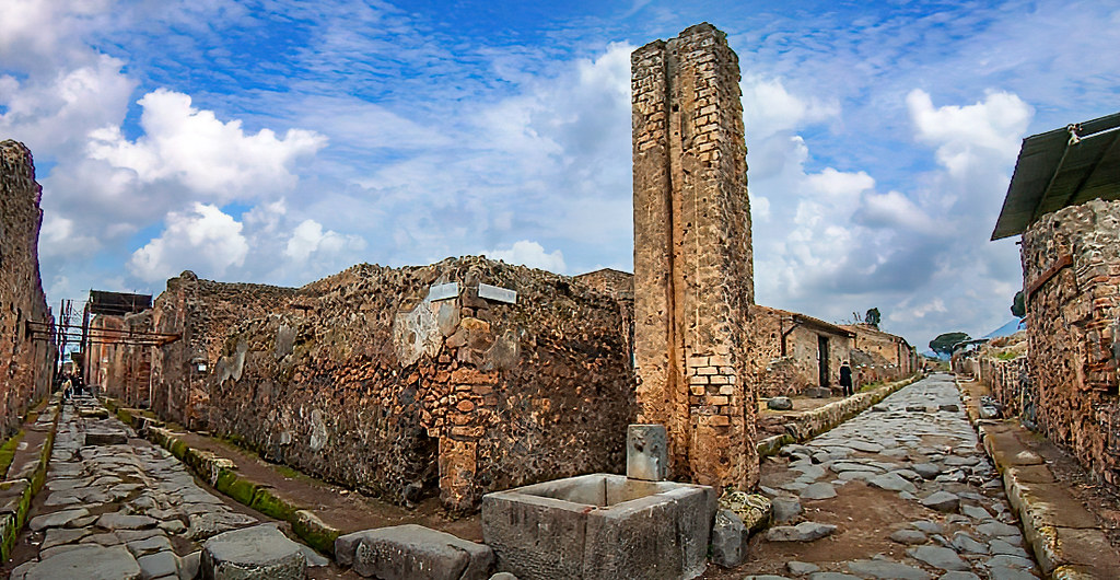 Modern living room featuring a smart assistant device and a small computer board