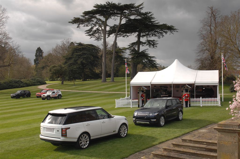 Researchers analyzing a holographic brain model in a high‑tech lab