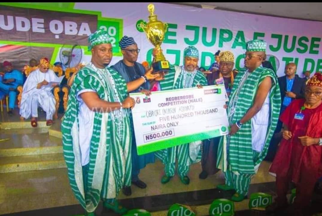 A person interacting with a glowing digital AI interface on a laptop