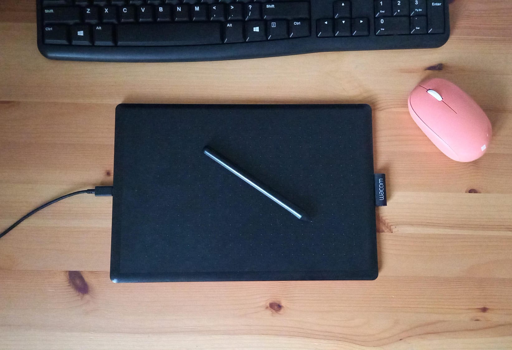 A serene office workspace with a laptop and monitor.